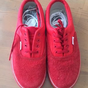 Boys red Vans.